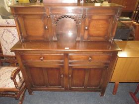 A 20TH CENTURY OAK COURT CUPBOARD