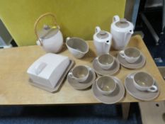 A POOLE POTTERY TEA/COFFEE SET TOGETHER WITH MATCHING CRACKER BARREL AND BUTTER DISH