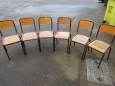 A SELECTION OF SIX STACKING INDUSTRIAL STYLE METAL AND WOOD CHAIRS