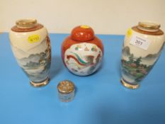A SMALL PAIR OF JAPANESE DECORATIVE VASES TOGETHER WITH A LIDDED GINGER JAR