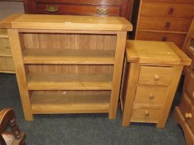A LIGHT OAK OPEN BOOKCASE AND A BEDSIDE CHEST (2)