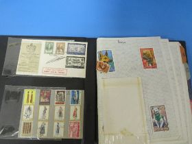 A STAMP ALBUM AND CONTENTS