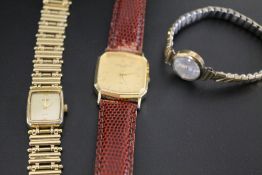 A 9 CARAT GOLD ROMA WRIST WATCH ON EXPANDING GOLD PLATED BRACELET TOGETHER WITH TWO OTHER WATCHES (