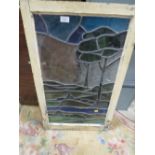 AN ART NOUVEAU LEADED GLASS PANEL