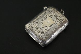 A HALLMARKED SILVER VESTA