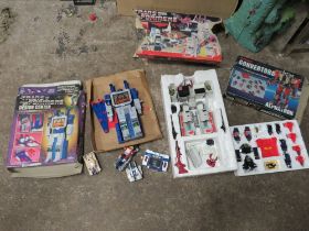 A BOXED TRANSFORMERS AUTOBOT METROPLEX (BOX A/F), BOXED TRANSFORMERS DESIGN CENTRE AND A BOXED