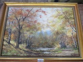 A GILT FRAMED OIL ON CANVAS OF A WOODLAND SCENE SIGNED LOWER LEFT 'ALAN PREECE', 37 X 52 CM