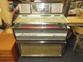 A 1960S WURLITZER AMERICANA 3100 JUKEBOX - 80 PLAYS ON 7" SINGLE RECORDS CONVERTED TO 240v MAINS