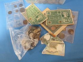 A TUB OF WORLD COINS AND BANK NOTES