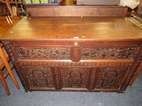 AN ANTIQUE OAK CARVED COFFER - W 13 cm