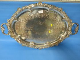 A LARGE SILVER PLATED TWIN HANDLED SERVING TRAY