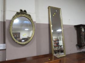 AN OVAL MIRROR AND A RECTANGULAR MIRROR (2)