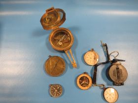 A COLLECTION OF VINTAGE COMPASSES