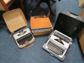 A SOLID STATE AMPLIFIER TOGETHER WITH TWO TYPEWRITERS (3)