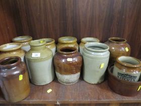 A SELECTION OF TWELVE STONE WAR JARS