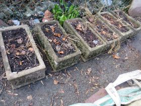 SIX CONCRETE PLANTERS