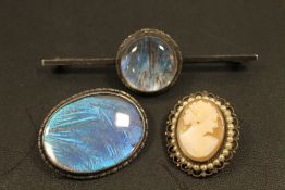 TWO LARGE SILVER BROOCHES AND A SHELL CAMEO BROOCH