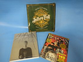 THREE COLLECTORS BOOKS TO INCLUDE ASTRID KIRCHHER "A RETROSPECTIVE " (THE BEATLES), GOLD