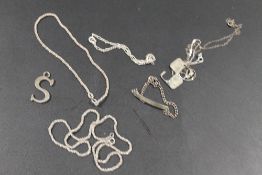 A QUANTITY OF SILVER NECKLACES AND BRACELETS