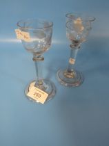 TWO MID 18TH CENTURY CORDIAL DRINKING GLASS, EACH ENGRAVED TO THE BOWLS WITH HOHO BIRDS ROSEBUDS AND