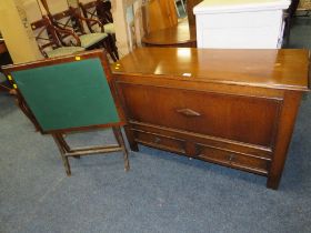 A VINTAGE MAHOGANY FOLDING TABLE AND AN OAK MULE CHEST (2)
