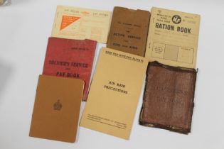 MILITARY EPHEMERA, TO INCLUDE 2 SOLDIERS SERVICE AND PAY BOOKS ETC