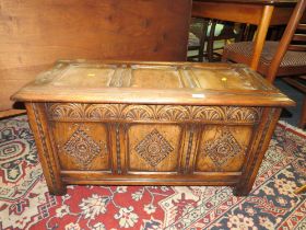 A SMALL OAK CARVED PANELLED COFFER - W 90 cm