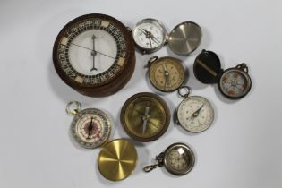 A SMALL TRAY OF EIGHT VARIOUS VINTAGE COMPASSES