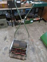 A VINTAGE PUSH MOWER