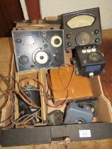 A TRAY OF VINTAGE ELECTRICAL TESTERS AND A DYNAMOTOR
