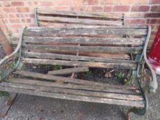 TWO WOODEN AND CAST IRON GARDEN BENCHES