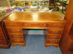 A REPRODUCTION TWIN PEDESTAL DESK WITH LEATHER TOP A/F