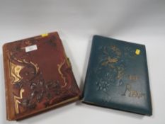 AN ANTIQUE PHOTO ALBUM AND CONTENTS TOGETHER WITH A POSTCARD ALBUM (2)