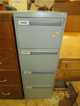 A METAL 4 DRAWER FILING CABINET