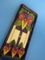 A MOORCROFT PIN TRAY DATED 2006 MARKED AS A SECOND