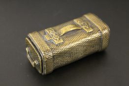 A UNUSUAL GILT METAL SNUFF BOX STYLE CONTAINER IN THE FORM OF A PIECE OF LUGGAGE