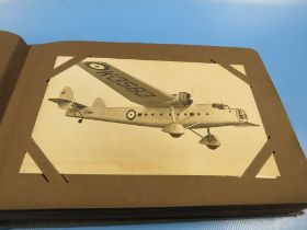 A VINTAGE PHOTO GRAPHICAL POSTCARDS ALBUM FILLED WITH MANY BLACK & WHITE IMAGES OF RAF FIGHTER