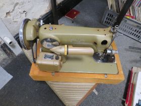 A CASED VINTAGE ALFA SEWING MACHINE