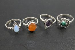 A COLLECTION OF 4 VINTAGE 925 SILVER GEMSTONE DRESS RINGS TO INCLUDE AMETHYST, JADE, OPAL ETC