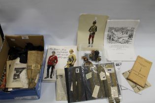 A BOX OF MILITARIA INCLUDING BADGES, WIRE CUTTERS, BUTTON STICKS ETC