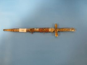 A GERMAN THIRD REICH STYLE DAGGER WITH EAGLE TO CROSS GUARD AND POMMEL IN STEEL, SCABBARD