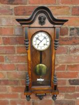 A MAHOGANY CASED VIENNA GONG STRIKE WALL CLOCK, having an 8 day German movement and white enamel dia