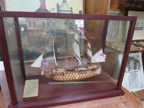 A LIMITED EDITION GLASSED CASED MODEL OF A HMS VICTORY