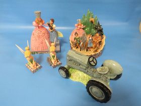 TWO TINKERBELL FIGURES WITH TWO WIZARD OF OZ FIGURES AND A MODEL OF A TRACTOR (5)