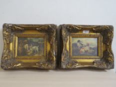 A PAIR OF HEAVY GILT FRAMED REPRODUCTION DOG PRINTS