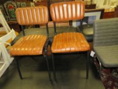 A PAIR OF MODERN TAN LEATHER CHAIRS