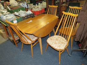 AN ERCOL GOLDEN DROP LEAF TABLE AND FOUR CHAIRS A/F