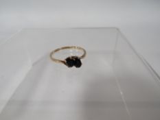 A HALLMARKED 9 CARAT GOLD TWO STONE SAPPHIRE RING approx weight 1.6g