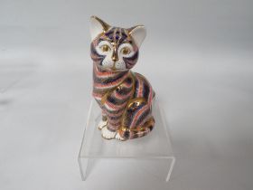 A ROYAL CROWN DERBY PAPERWEIGHT CAT WITH STOPPER