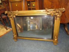 A MID VICTORIAN GILT OVERMANTLE MIRROR WITH CARVED DETAIL 82 X 130 CM